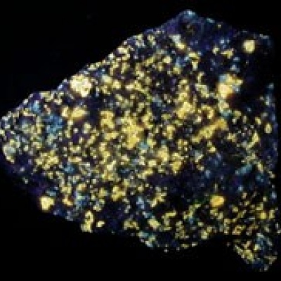 Norbergite under filtered UV Light